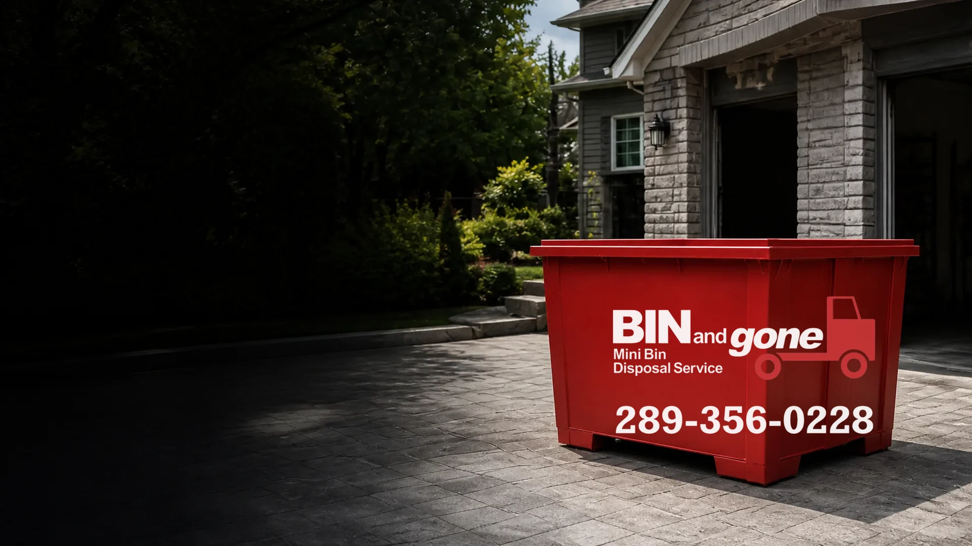 Illustration of a branded red Bin and Gone mini-bin on a private driveway.